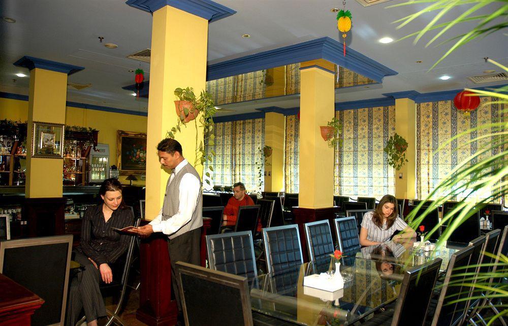 Concord International Hotel Manama Restaurant foto